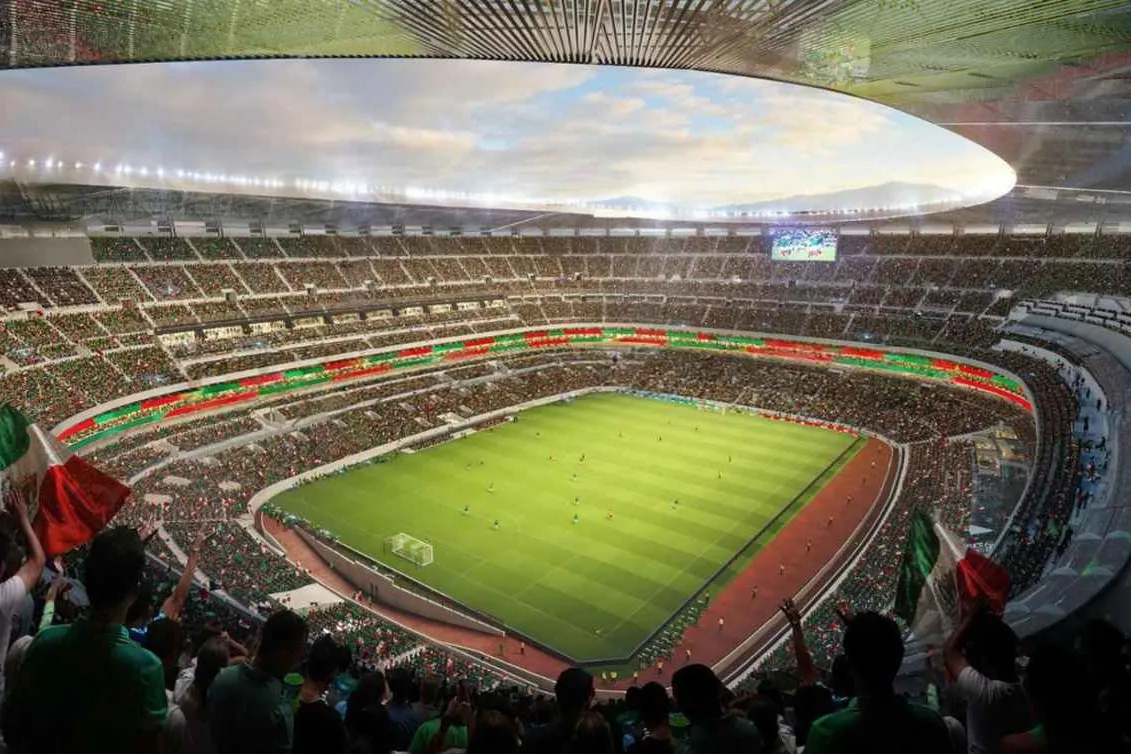 A packed Estadio Azteca in Mexico City under stadium lights before a World Cup match