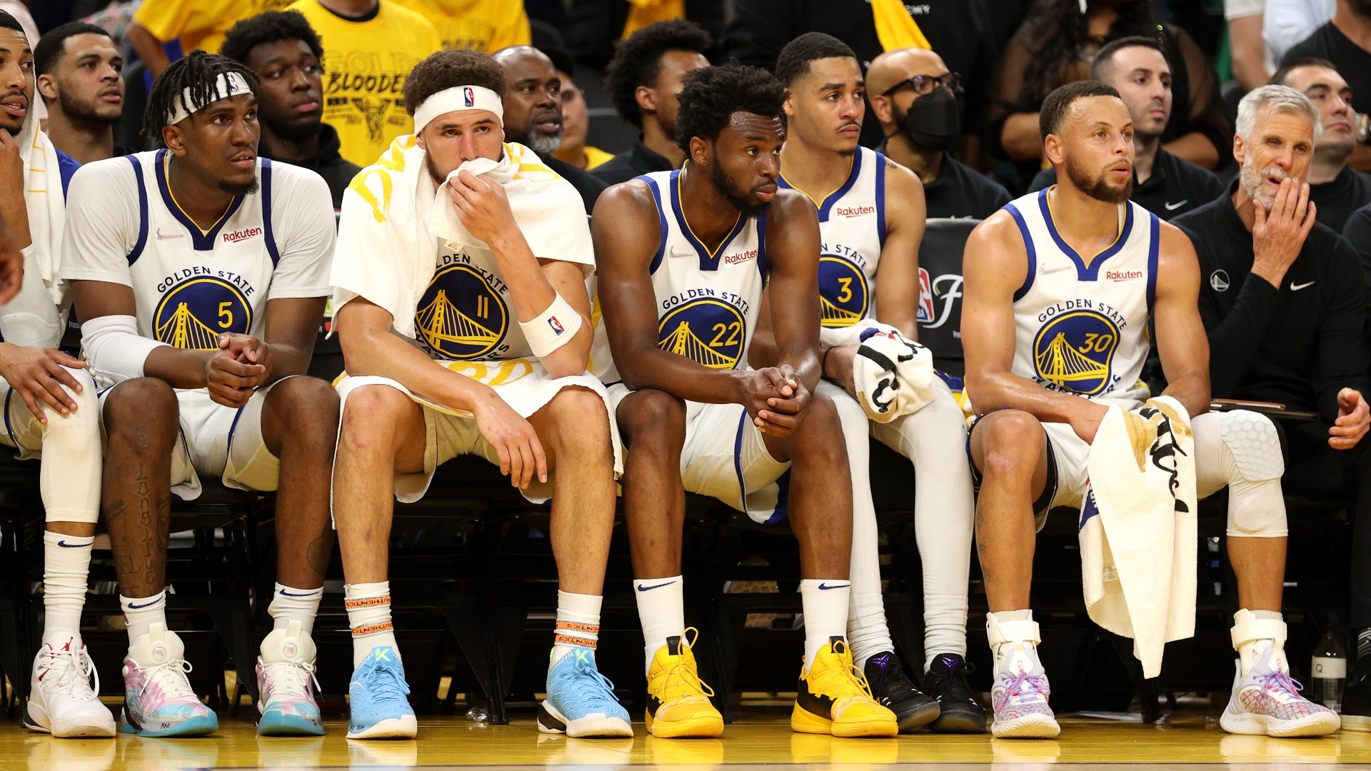 A team bench standing and locked in during live action, suggesting depth and consistency