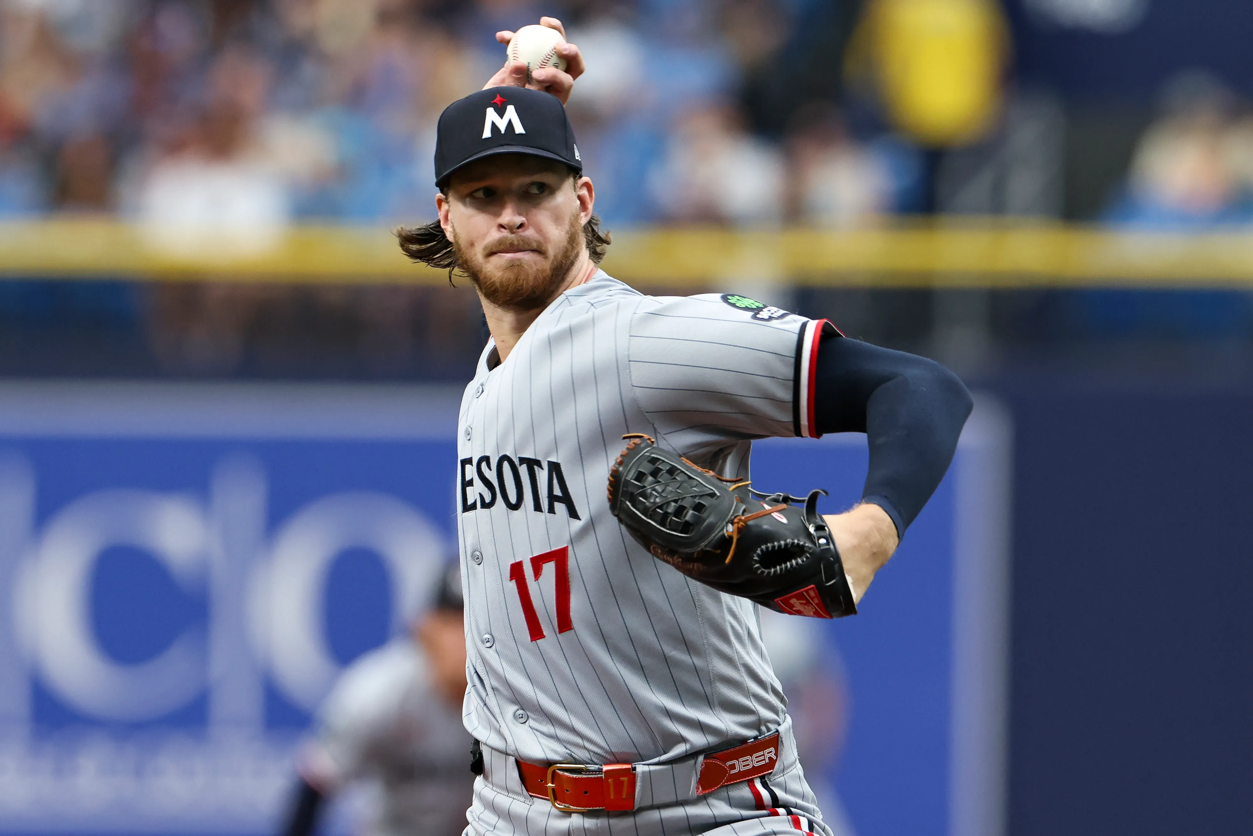 Bailey Ober in a Minnesota Twins uniform during a game, standing on the mound between pitches with the stadium background out of focus