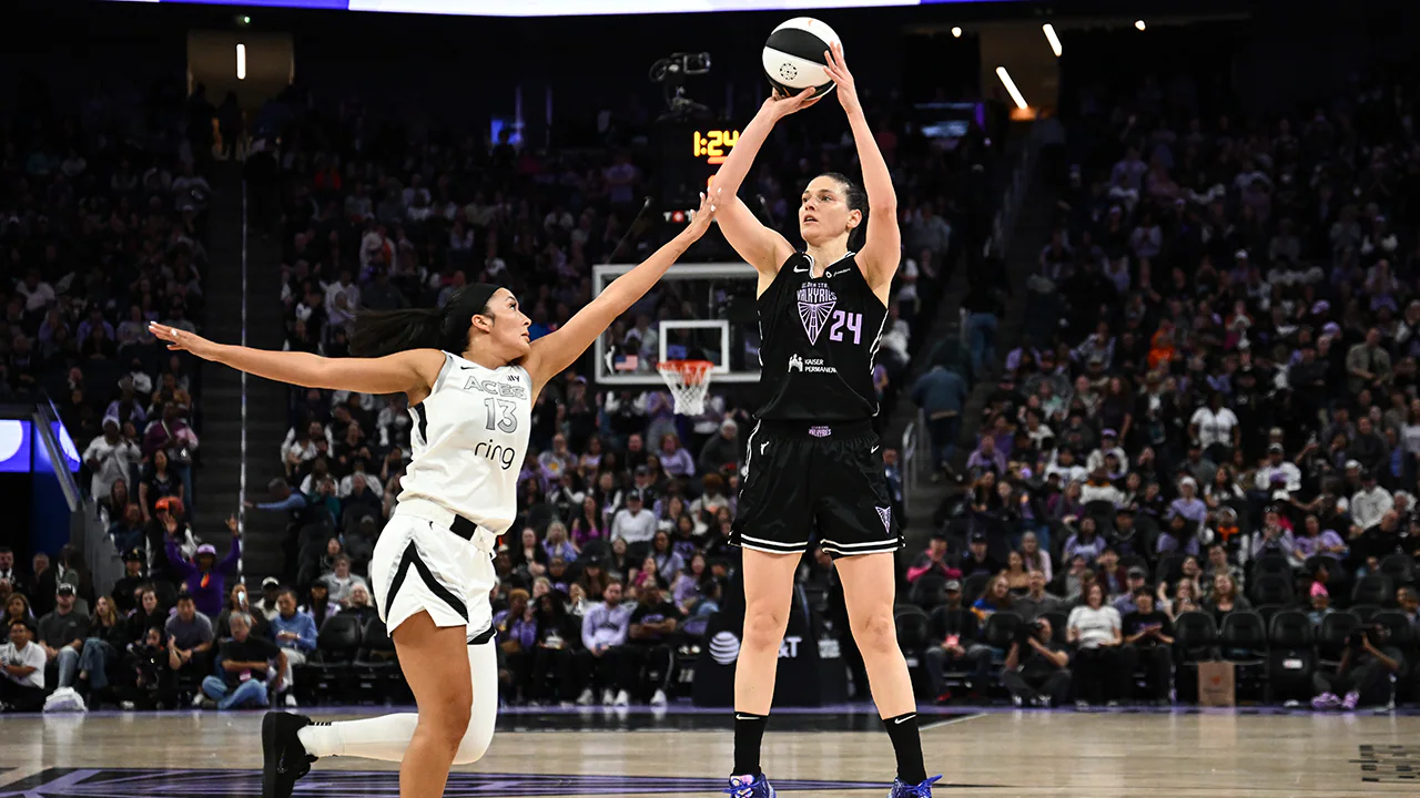 Cecilia Zandalasini rising into a jump shot during a 2026 WNBA playoff game with a defender contesting