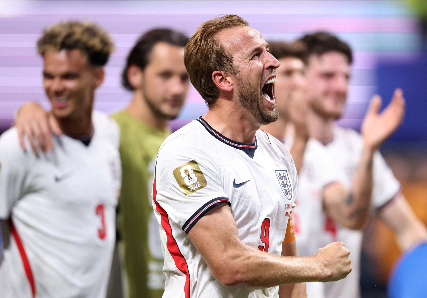 Harry Kane celebrating in an England kit after scoring a late goal against DR Congo at Mercedes-Benz Stadium in Atlanta