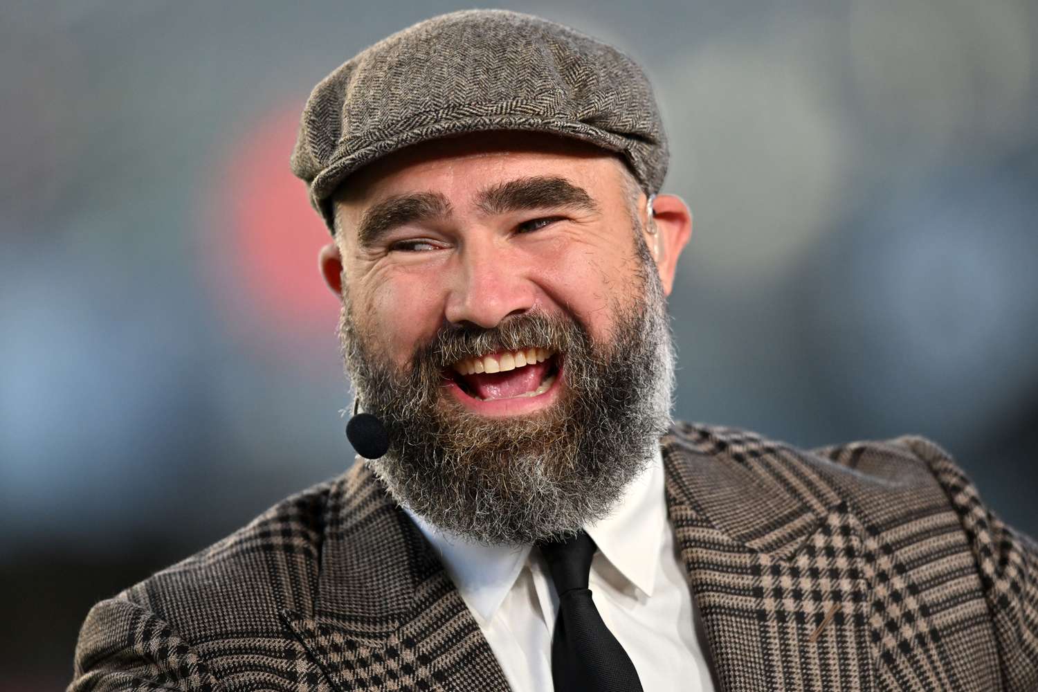 Jason Kelce on the ESPN Monday Night Football set wearing a headset while speaking during live game analysis.