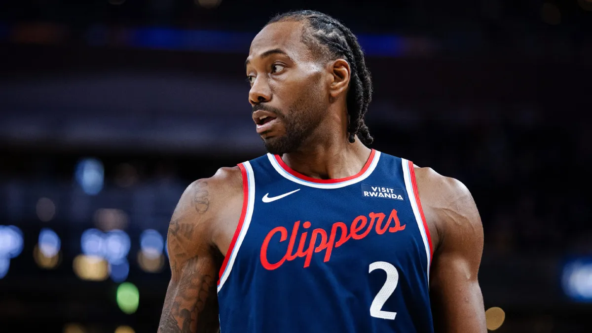 Kawhi Leonard in a Los Angeles Clippers uniform during live game action in an NBA arena, photographed courtside