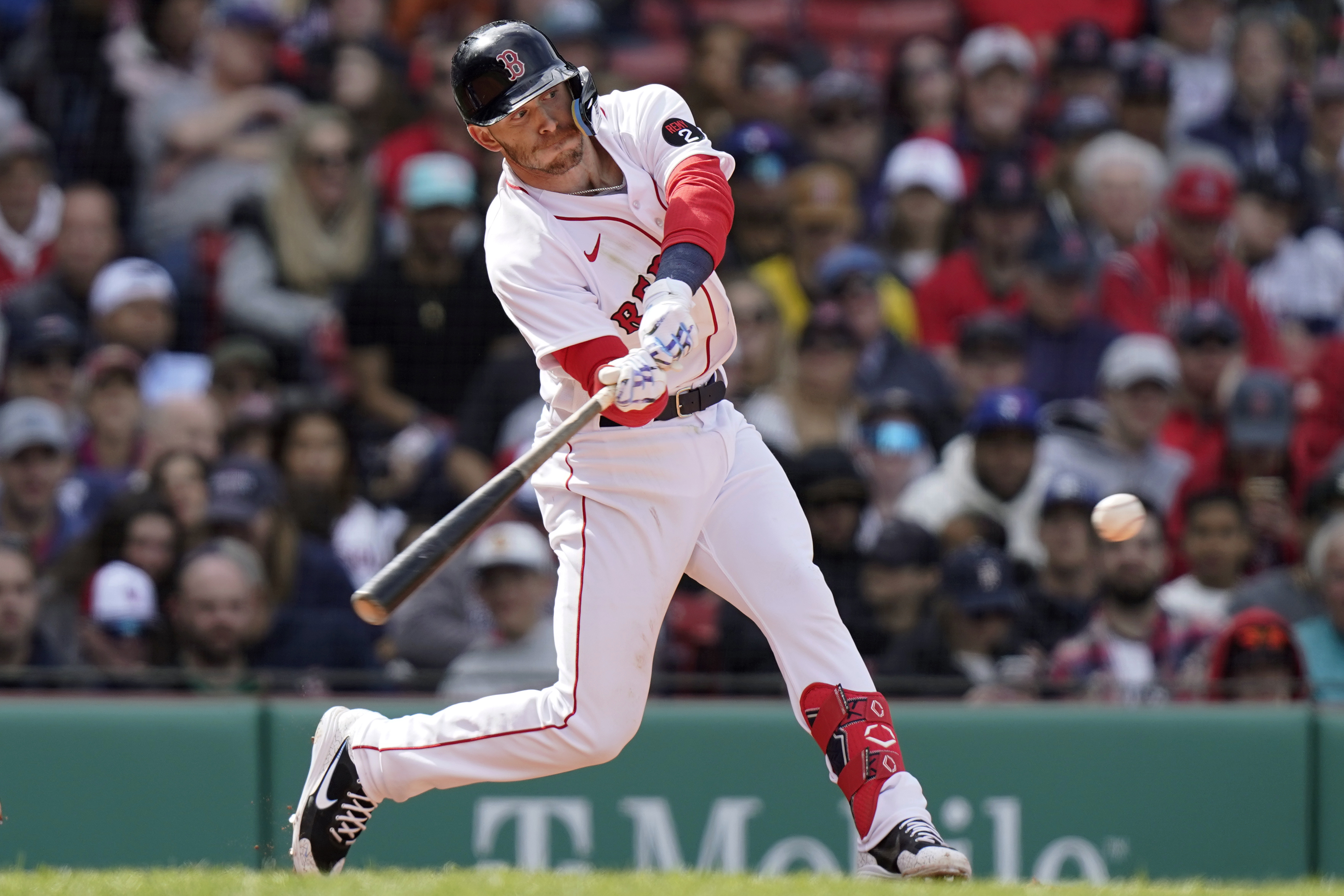 Trevor Story in a Boston Red Sox uniform standing on the infield dirt between pitches with a focused expression